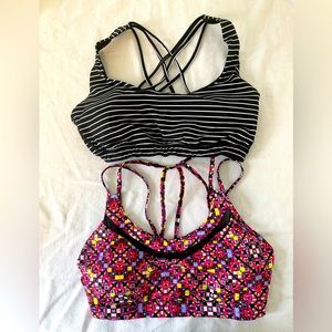 Two Victoria’s Secret sports bras size M